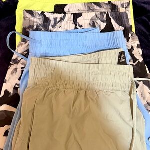 Set of four ladies work out shorts.